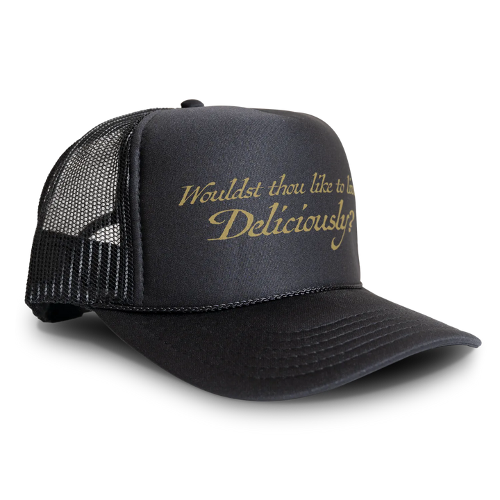 Black trucker hat with gold lettering.