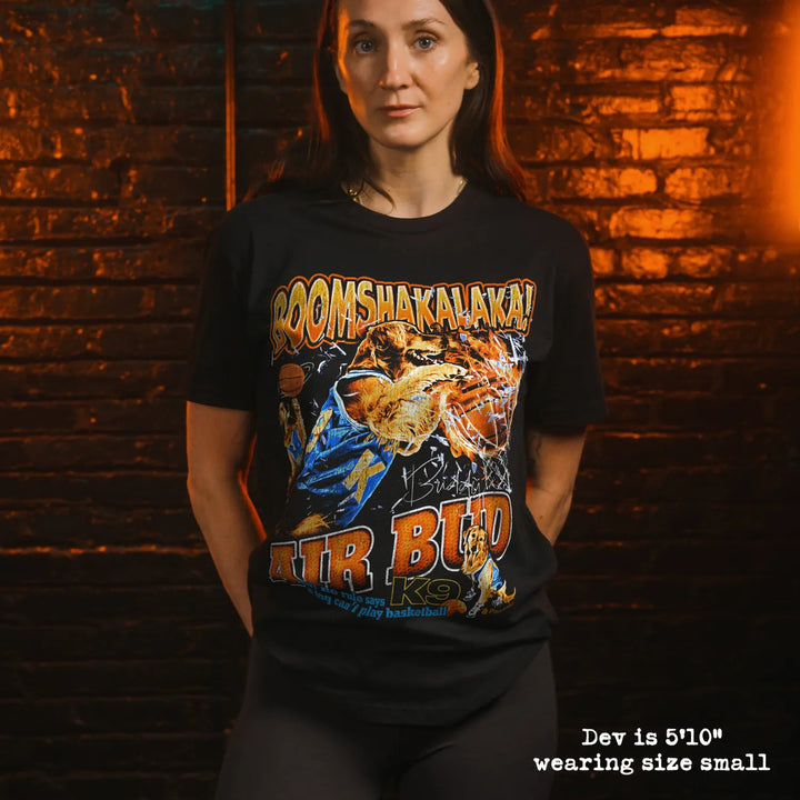Model wearing black premium tee with air bud graphic 