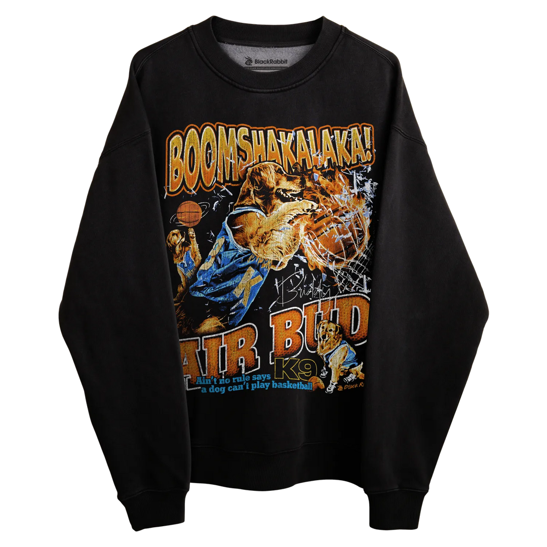 Black crewneck sweatshirt with ’air bud’ graphic design featuring a dog playing basketball, vibrant colors and bold text.