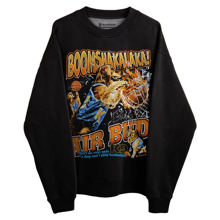 Black crewneck sweatshirt with ’air bud’ graphic design featuring a dog playing basketball, vibrant colors and bold text.