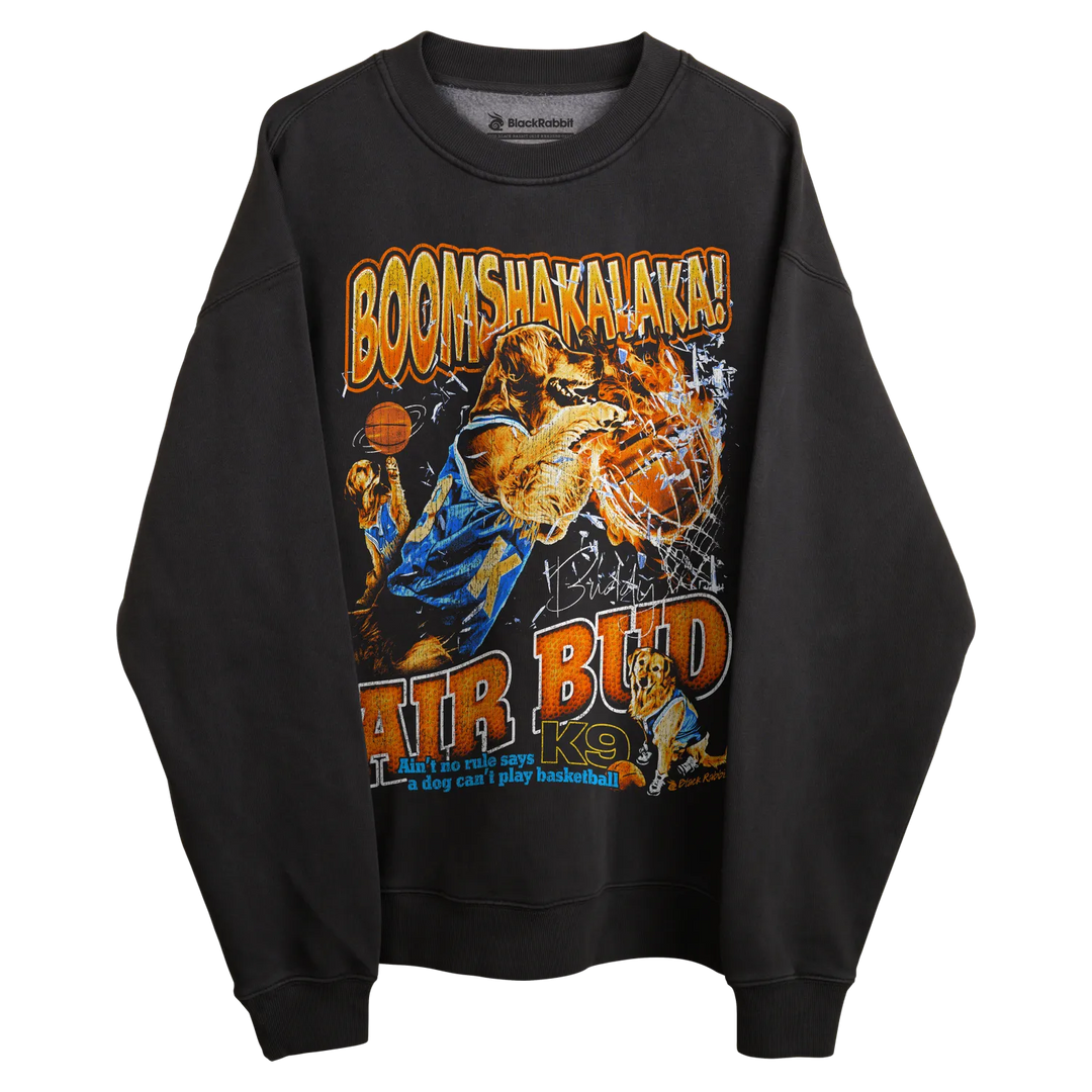 Black crewneck sweatshirt with air bud k9 graphic design, featuring a dog playing basketball in action.