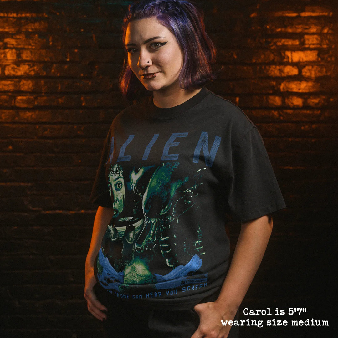 Model wearing heavy tee with alien graphic 