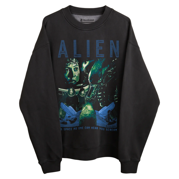 Black alien sweatshirt with blue text and graphic design featuring a space scene.
