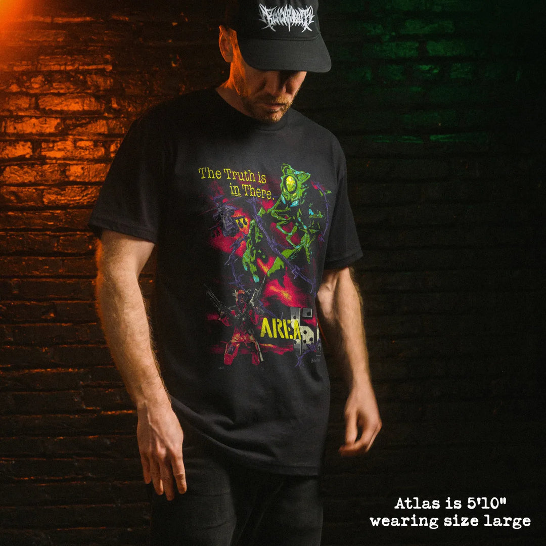 Male model wearing black premium tee with air bud graphic 