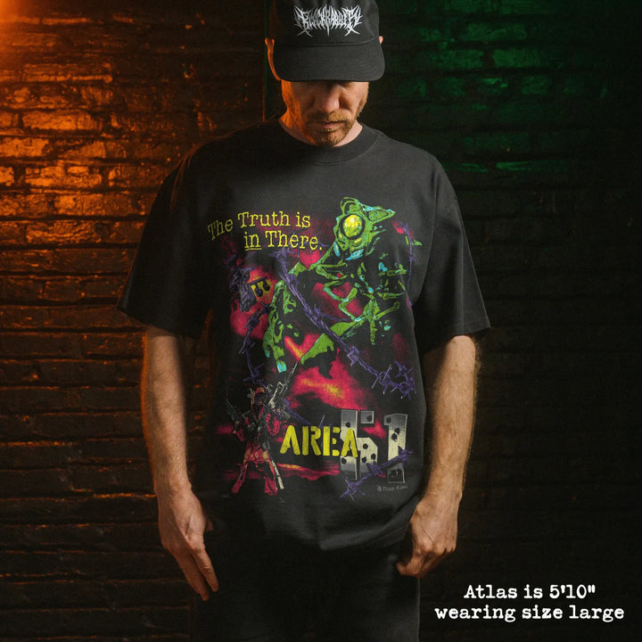 Model wearing heavy tee with area 51 graphic 