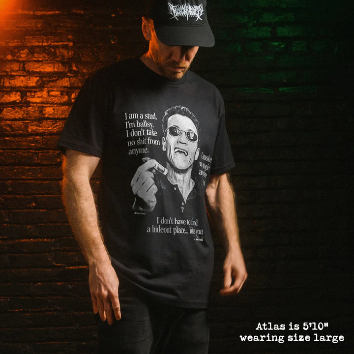 Male model wearing black premium tee with arnold stogie graphic 