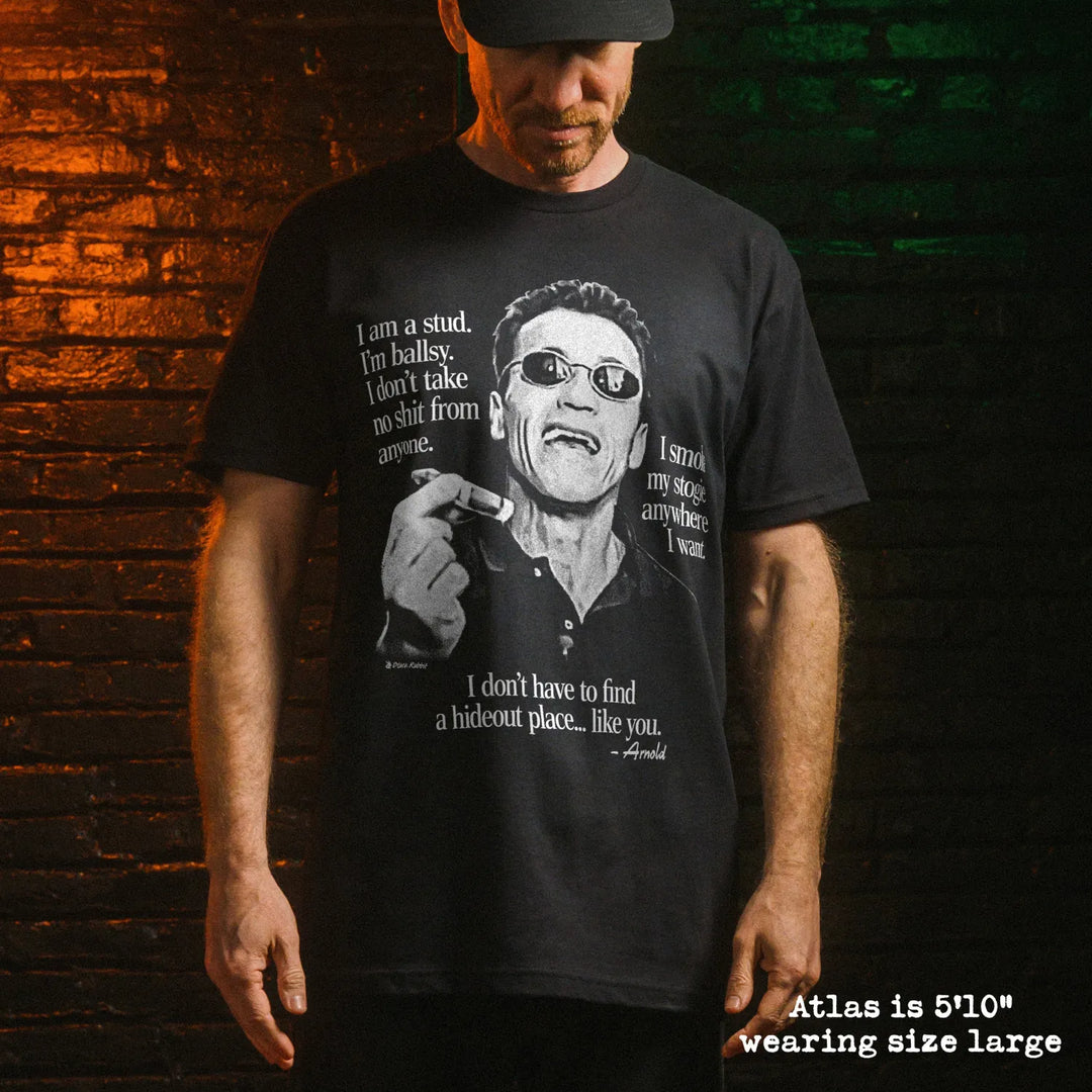 Male model wearing black premium tee with arnold stogie graphic 