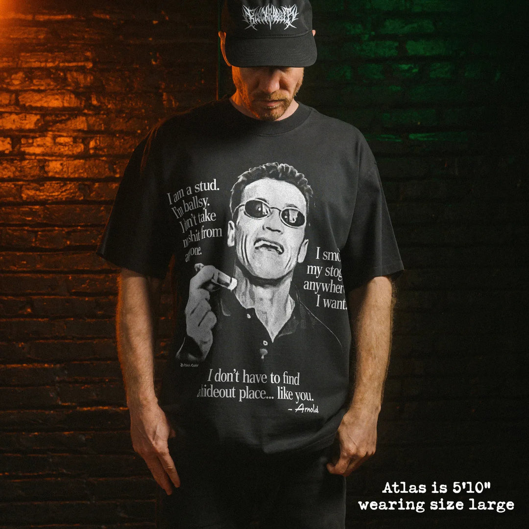Model wearing heavy tee with arnold stogie graphic 