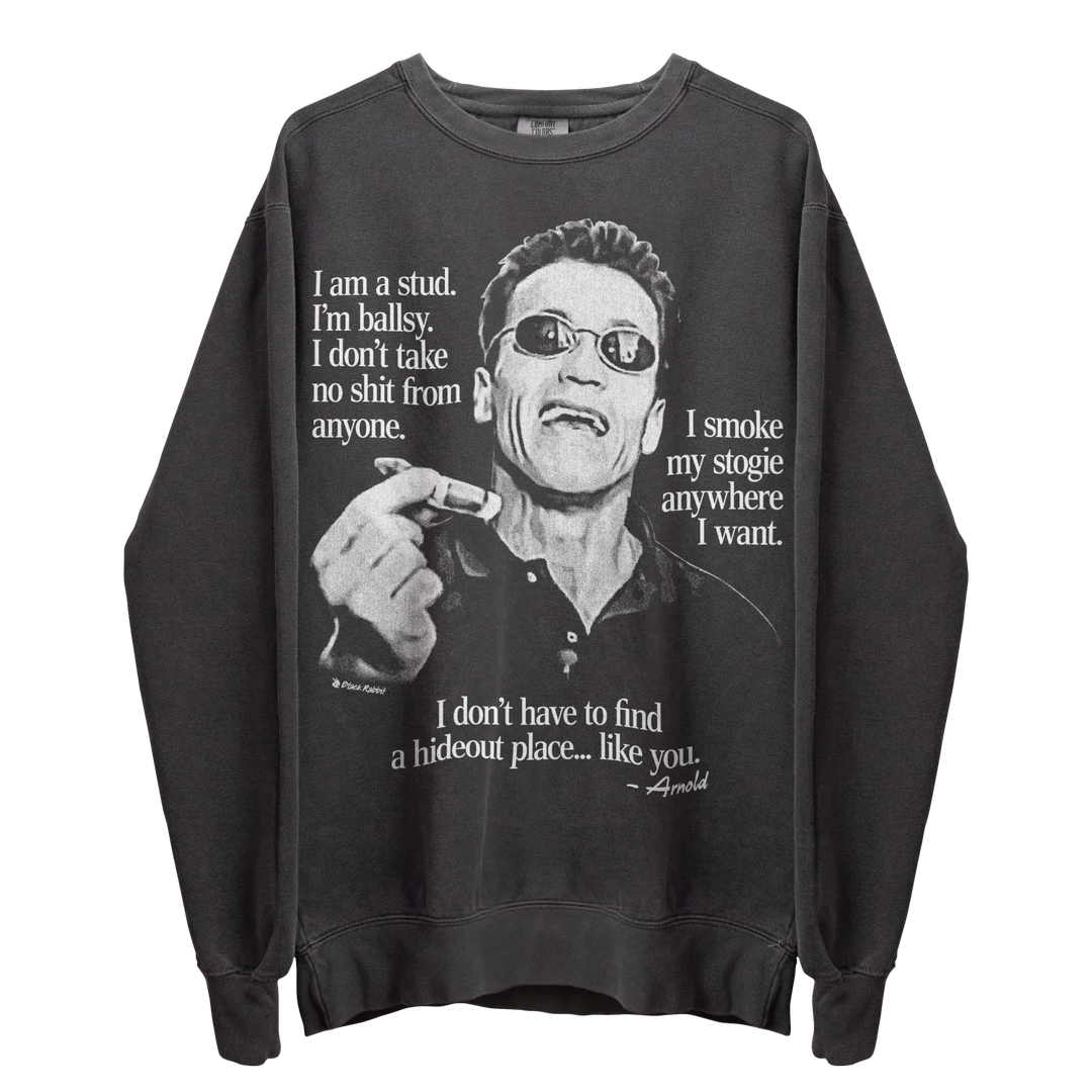 Dark gray crewneck sweatshirt with a black and white image of Arnold Schwarzenegger smoking a cigar and quotes.
