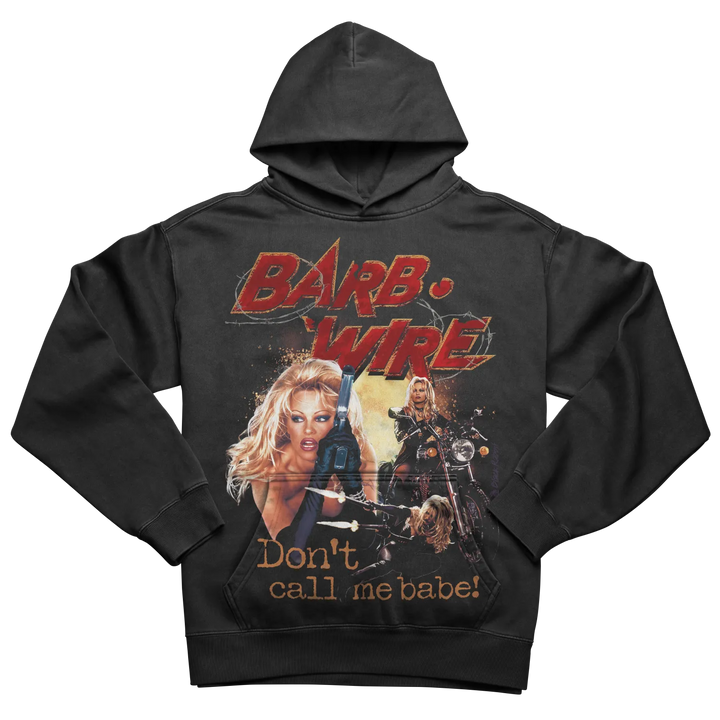 Black hoodie with graphic design of ’barb wire’ and slogan ’don’t call me babe!’ featuring a woman holding a gun.