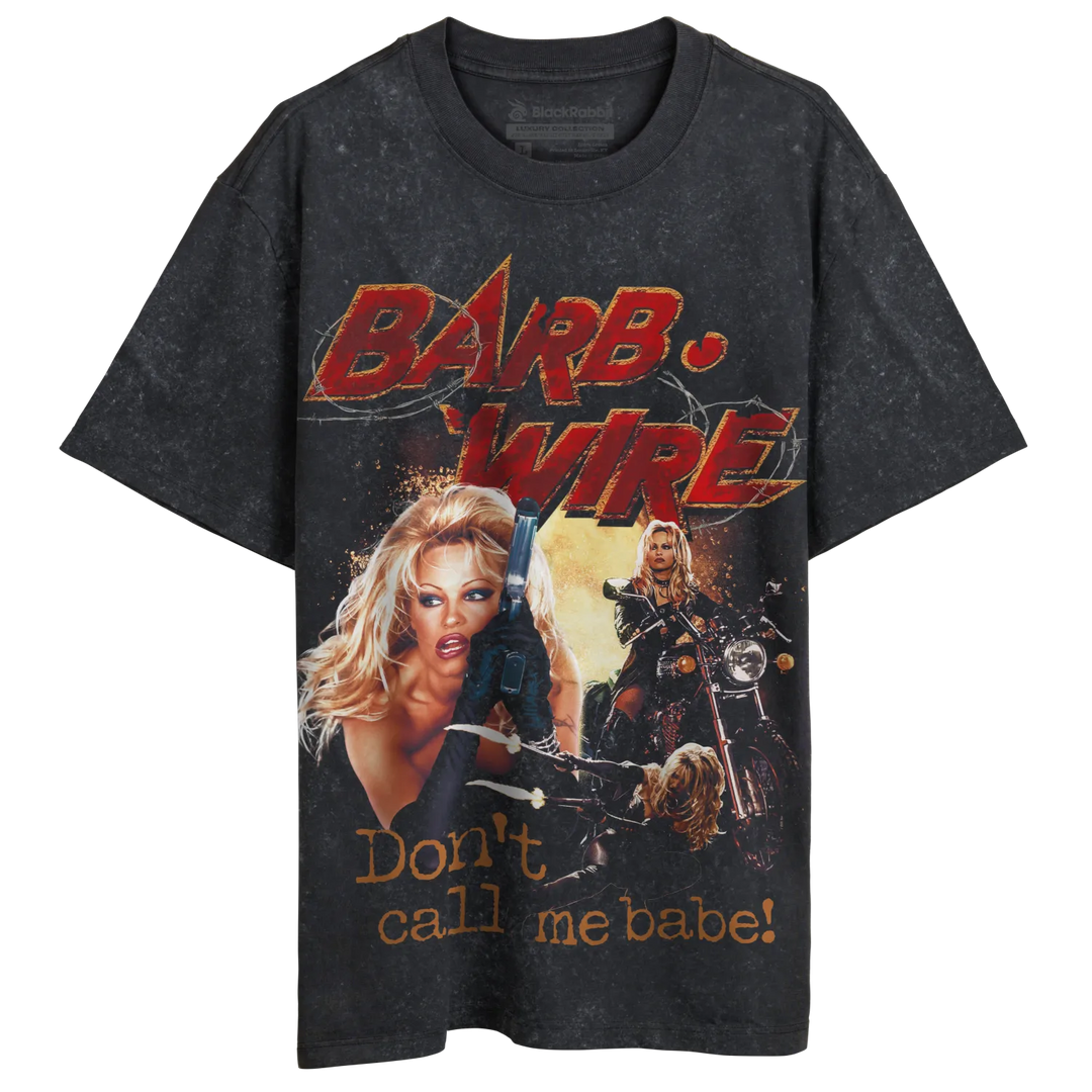 Black t-shirt with graphic design of a woman and motorcycle, ’barb wire’ in bold red letters below.