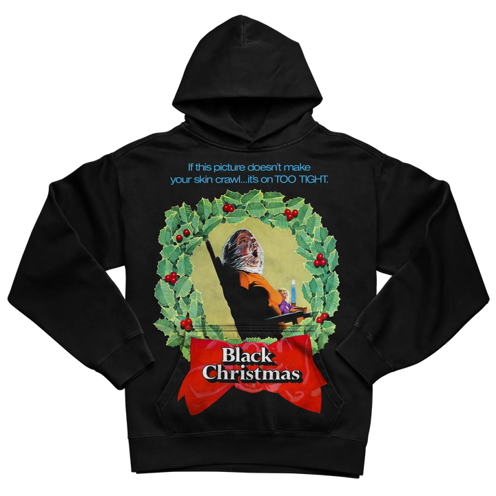 Black hoodie with ’black christmas’ design featuring a ghostly figure in wreath, red ribbon, and text.