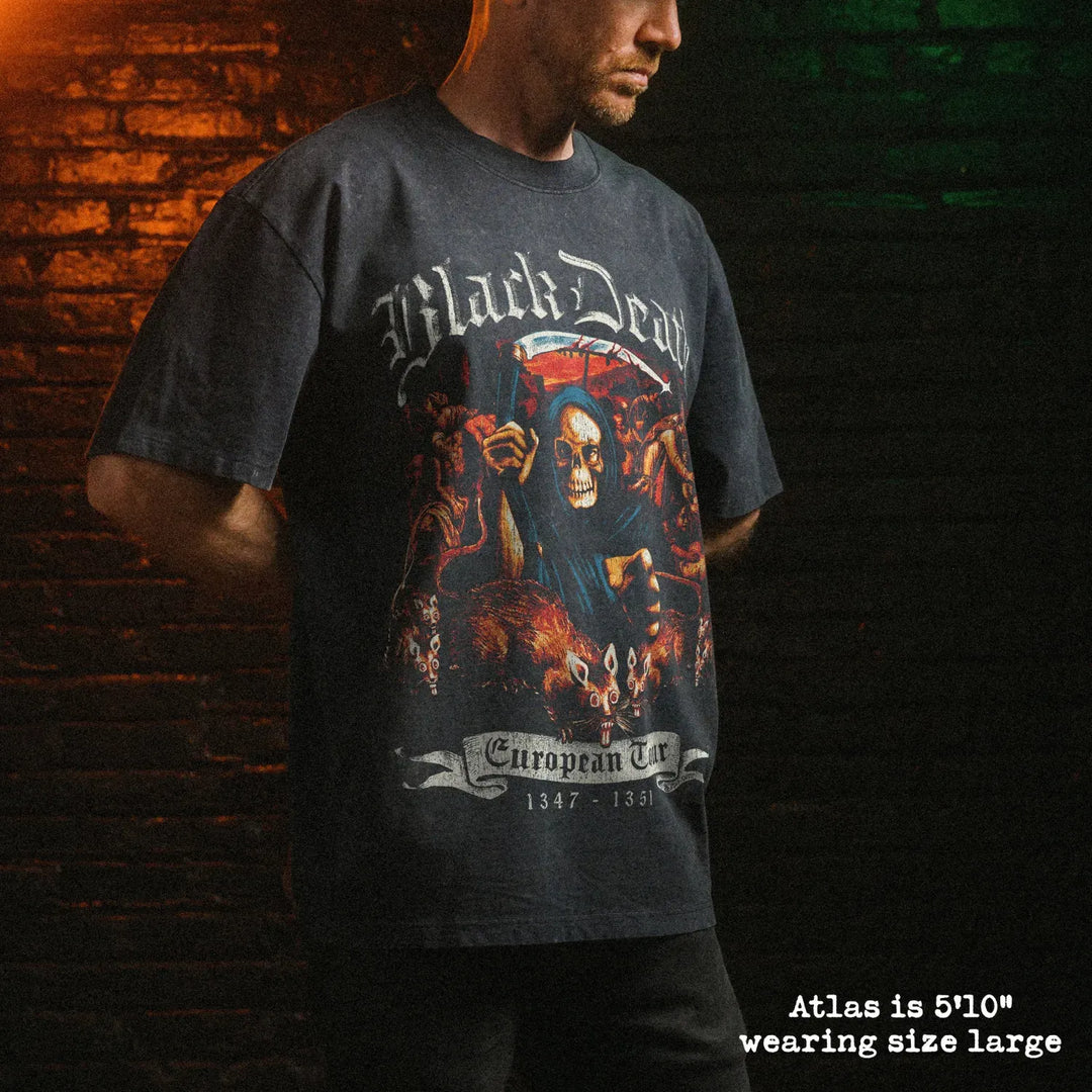 Male model wearing stone washed heavy tee with black death graphic 