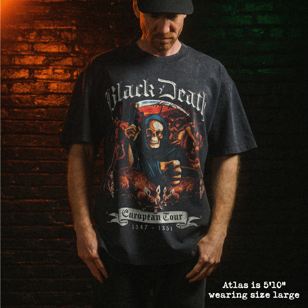 Male model wearing stone washed heavy tee with black death graphic 