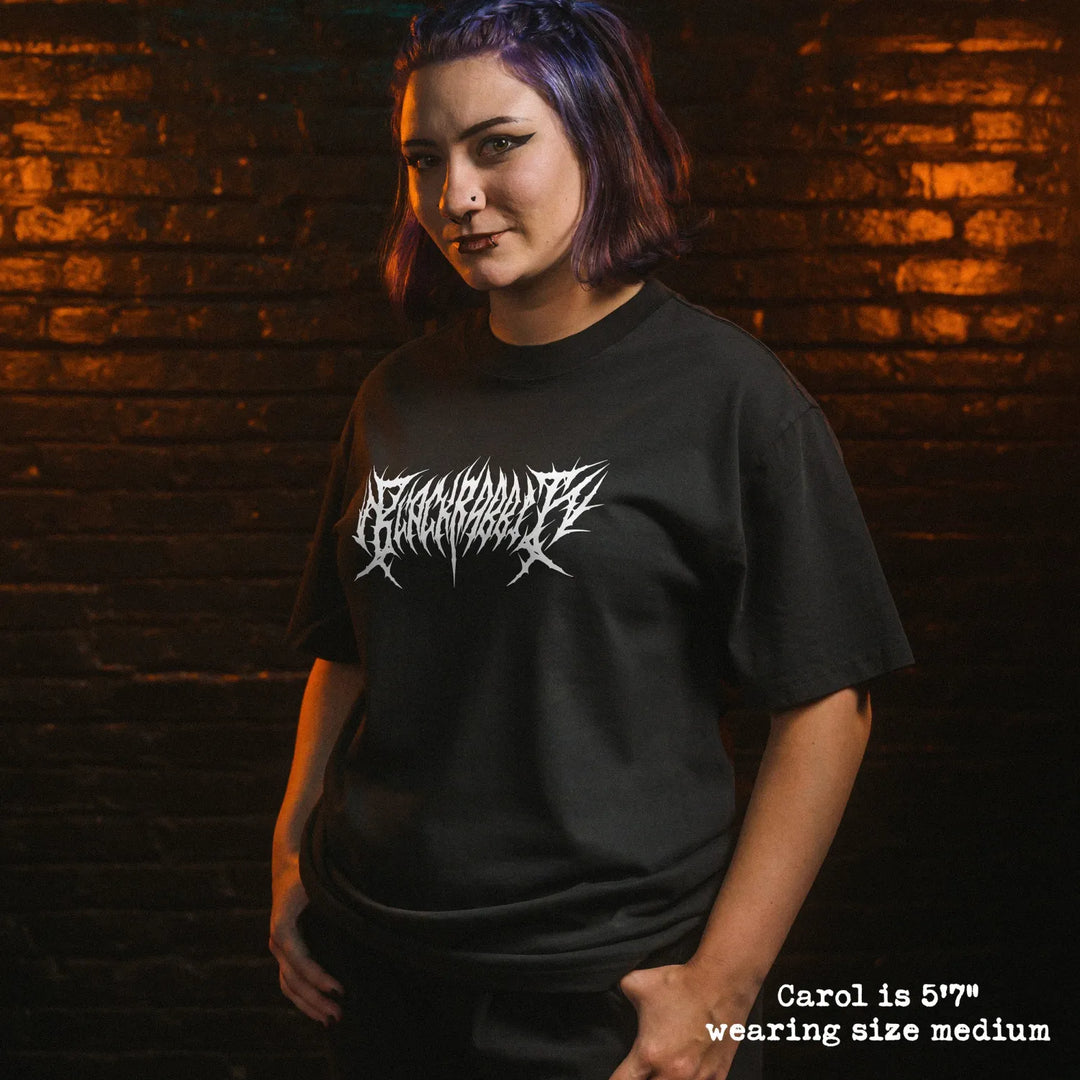 Model wearing heavy tee with black rabbit death metal graphic 