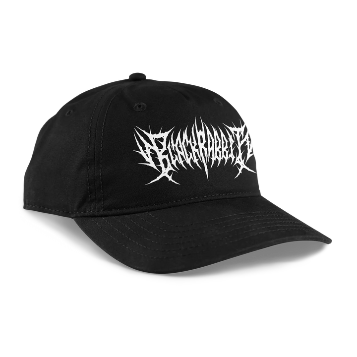 Black baseball cap with a white, spiky gothic font logo across the front.