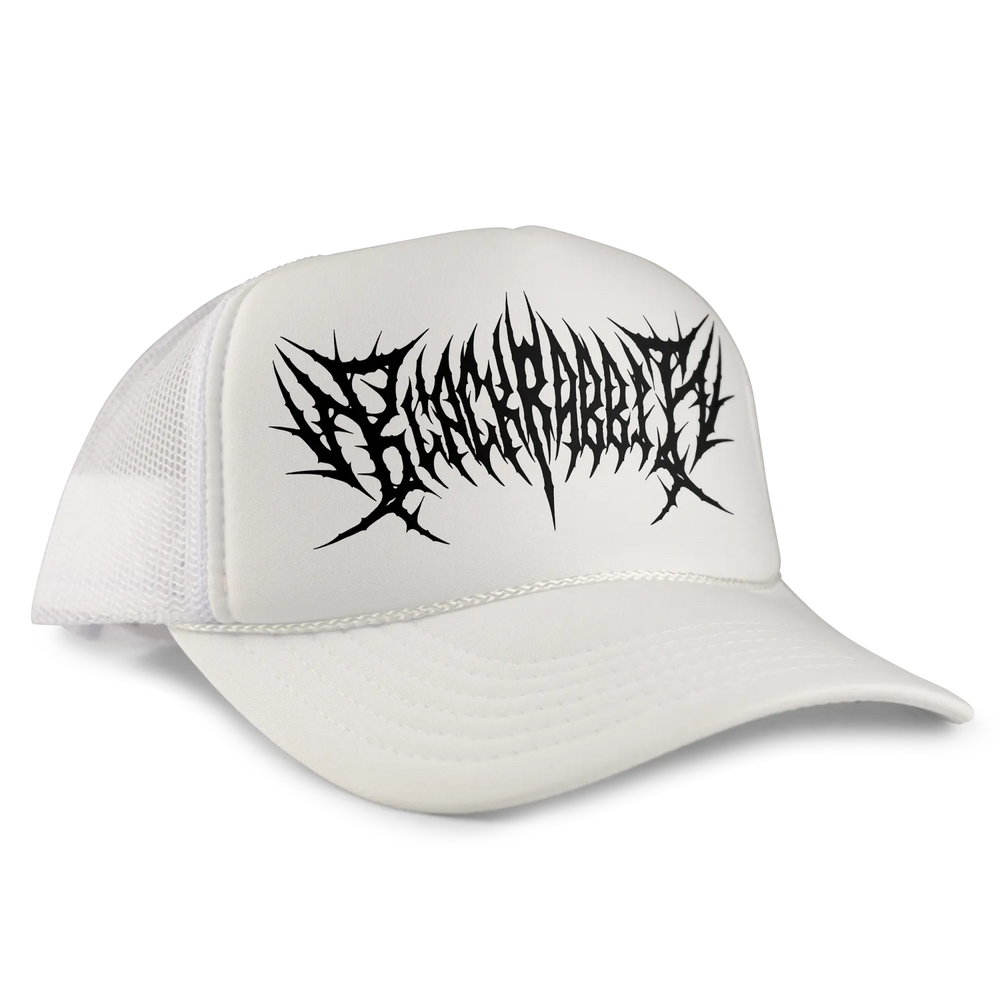 White trucker hat with a black spiked font design across the front.