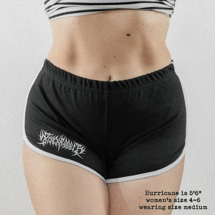 Front-view of Female model wearing the Black / White variant of Black Rabbit&