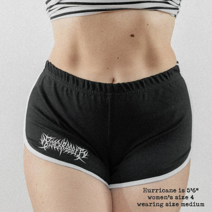 Front-view of Female model wearing the Black / White variant of Black Rabbit&