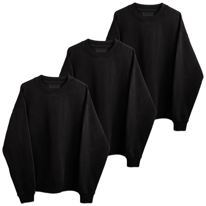 Three blank black rabbit crewneck sweatshirts in black long-sleeved cotton arranged in a tiered display