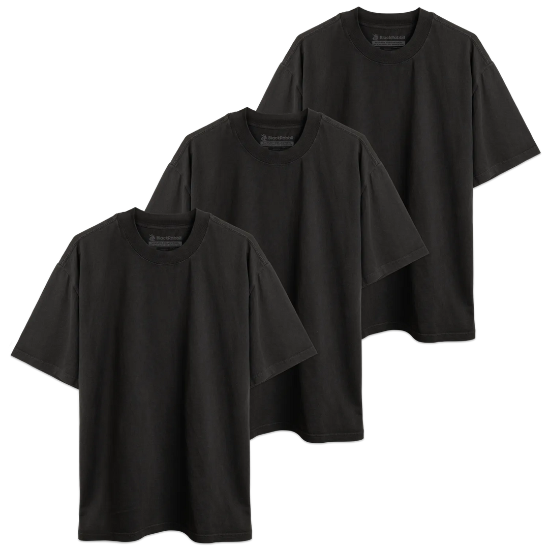 Three dark gray oversized crew-neck t-shirts with subtle brand tags in blank black rabbit luxury heavy tee collection