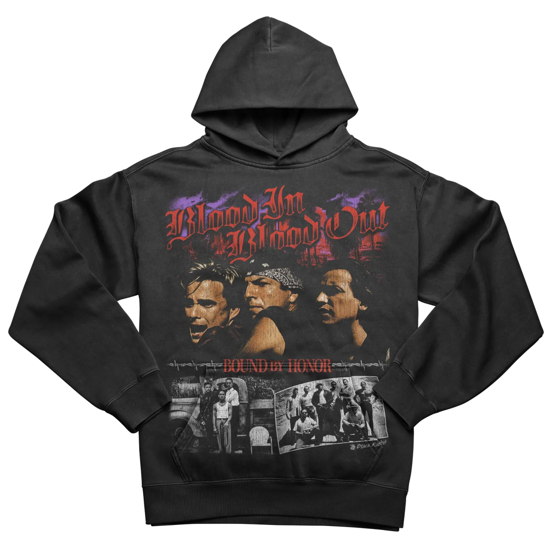 Black hoodie with a graphic print featuring three men’s faces, the title ’Blood In Blood Out,’ and smaller black-and-white photos.