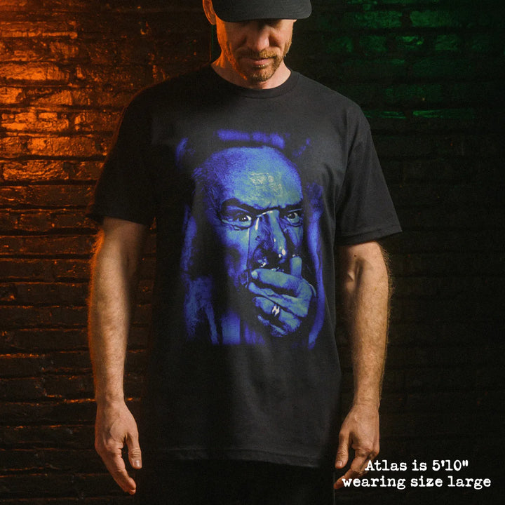 Male model wearing black premium tee with blue velvet graphic 