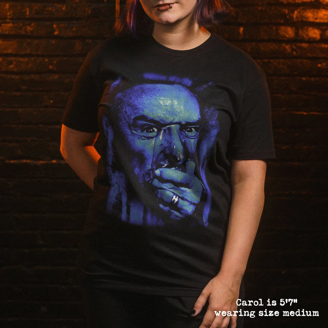 Model wearing black premium tee with blue velvet graphic 
