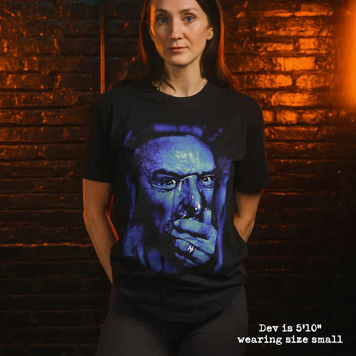Model wearing black premium tee with blue velvet graphic 