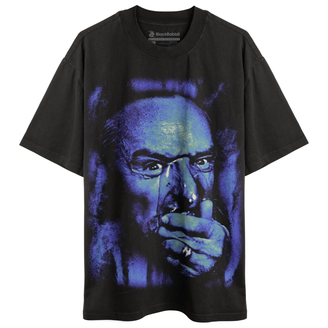 Black t-shirt with graphic print of a man smoking, dark blue and purple tones.