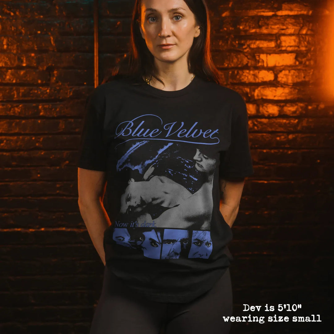 Model wearing black premium tee with blue velvet graphic 
