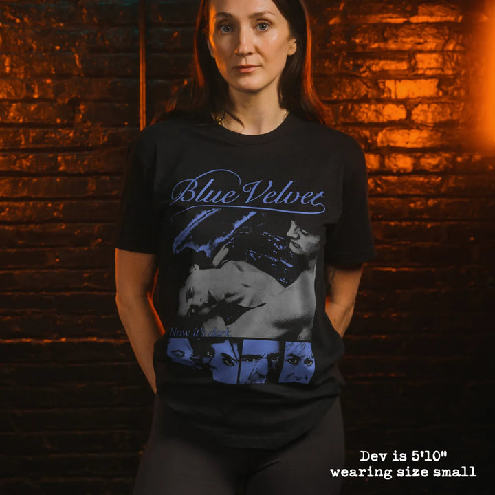 Model wearing black premium tee with blue velvet graphic 