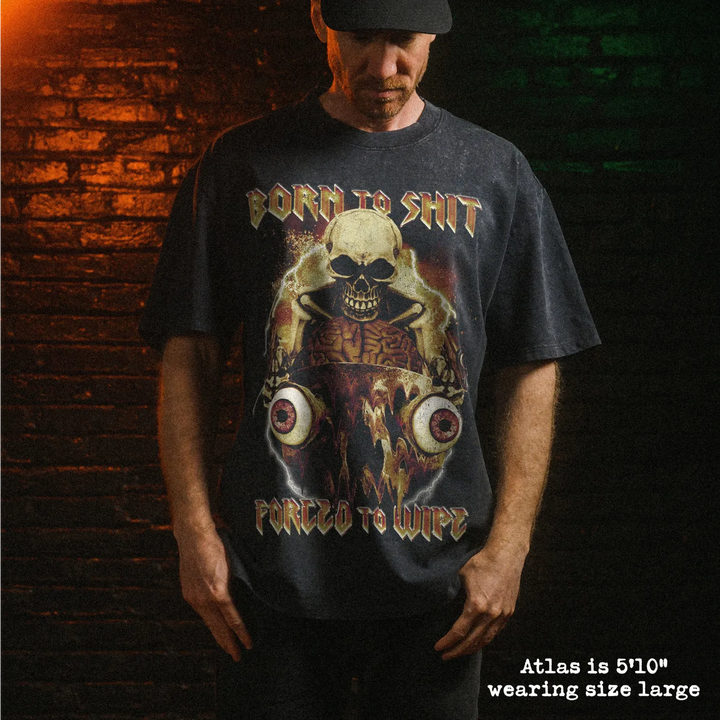 Male model wearing stone wash heavy tee with born to shit graphic 