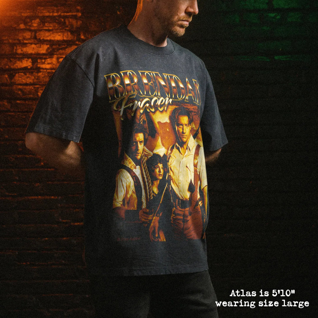 Male model wearing stone wash heavy tee with brendan fraser metal graphic 