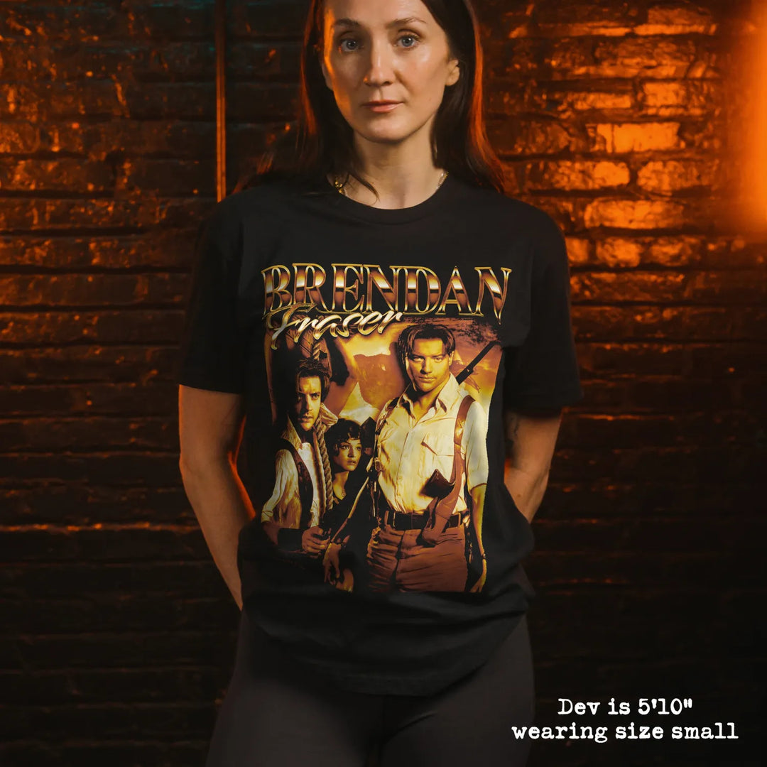 Model wearing black premium tee with brendan fraser graphic 