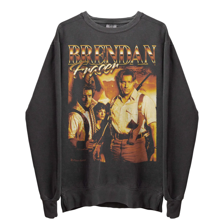 Dark grey long-sleeved sweatshirt with a graphic print of Brendan Fraser and other characters from ’The Mummy’ movie.