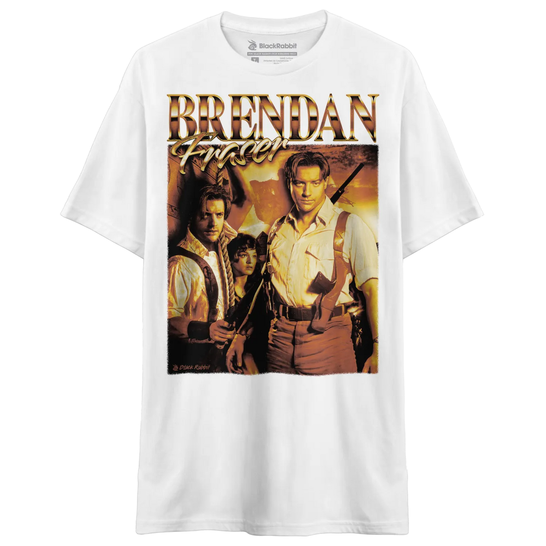 White t-shirt with a vintage-style graphic of Brendan Fraser and other characters from ’The Mummy’ movie.