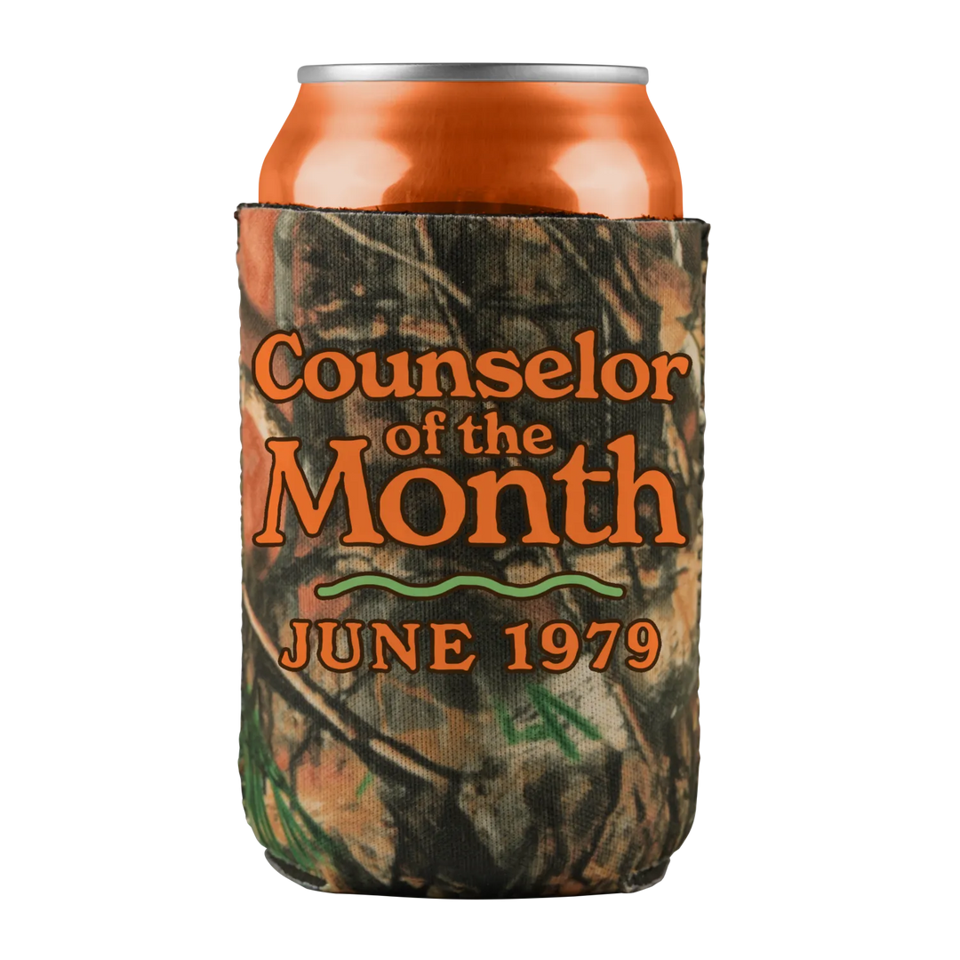 Camo-patterned beverage koozie with an orange soda can.