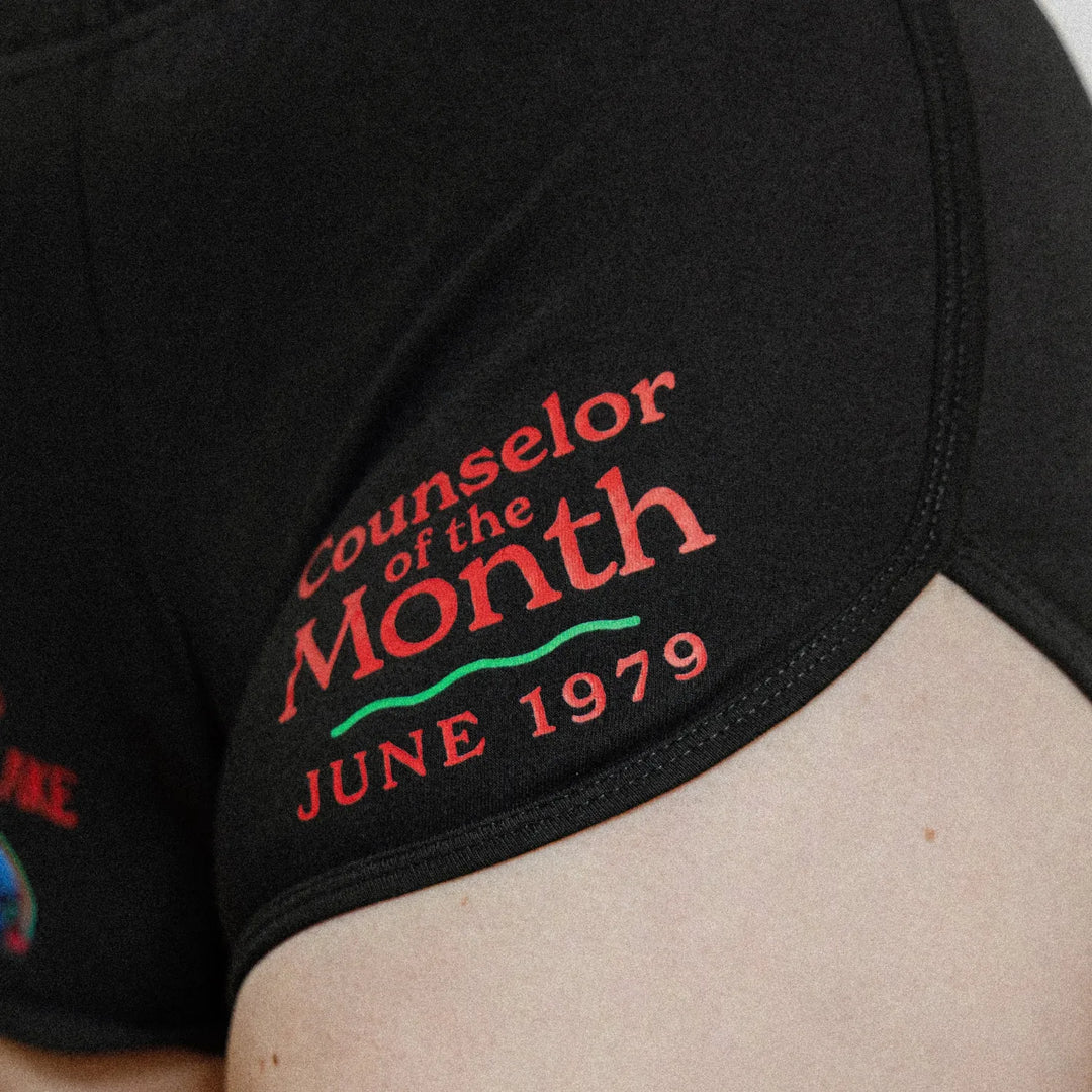 Rear-view of Female model wearing the Black variant of Black Rabbit&