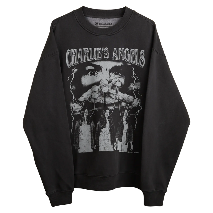 Black long-sleeved sweatshirt with ’charlie’s angels’ graphic design featuring three women in white outfits.