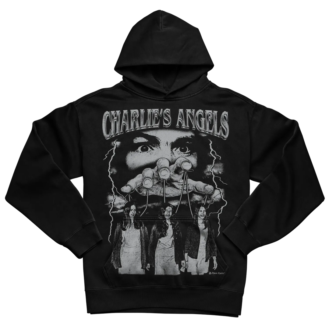 Black hoodie with ’charlie’s angels’ graphic and three female figures design, featuring a man’s face in the background.