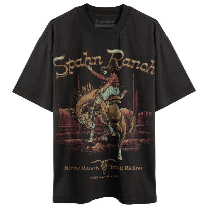 Black graphic t-shirt with a cowboy riding a bucking horse.