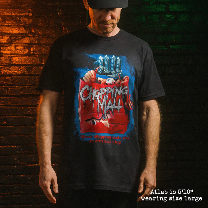 Male model wearing black premium tee with chopping mall graphic 