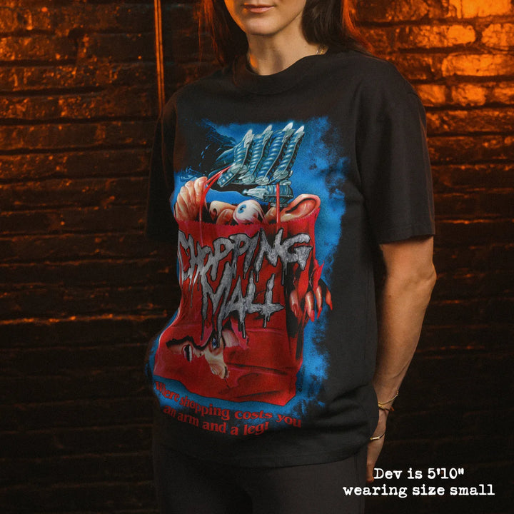 Model wearing heavy tee with chopping mall graphic 