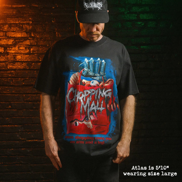 Model wearing heavy tee with chopping mall graphic 