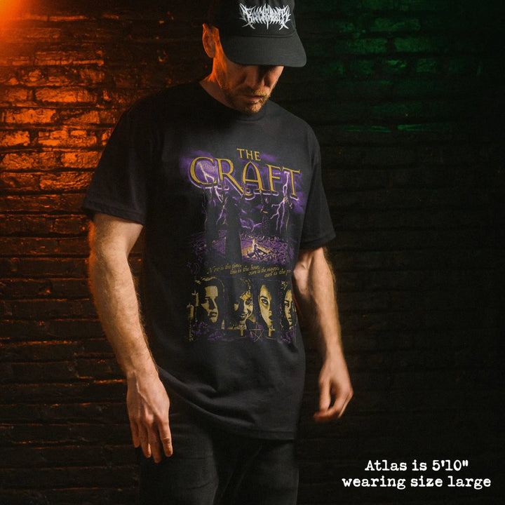 Male model wearing black premium tee with the craft graphic 