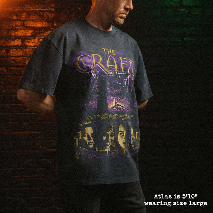 Male model wearing stone wash heavy tee with the craft graphic 