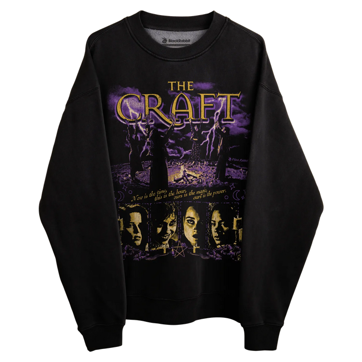 Black sweatshirt with ’the craft’ graphic design featuring four faces and lightning bolts.