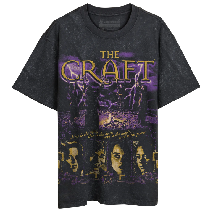 Dark grey t-shirt with a purple and gold graphic print of ’The Craft’ movie poster.