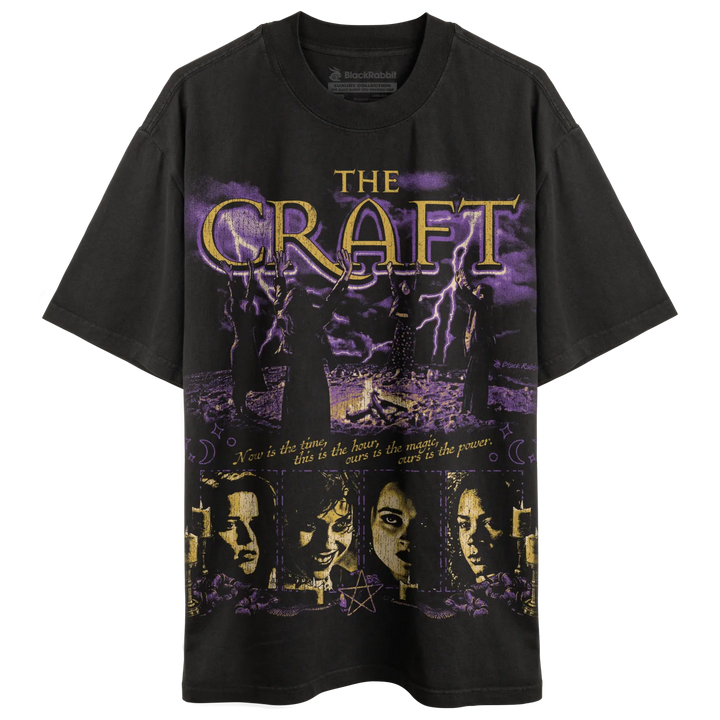 Black graphic t-shirt with a purple and gold ’The Craft’ design.